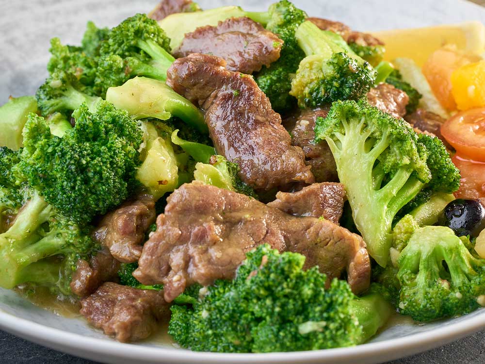 Bowl filled with traditional beef and broccoli