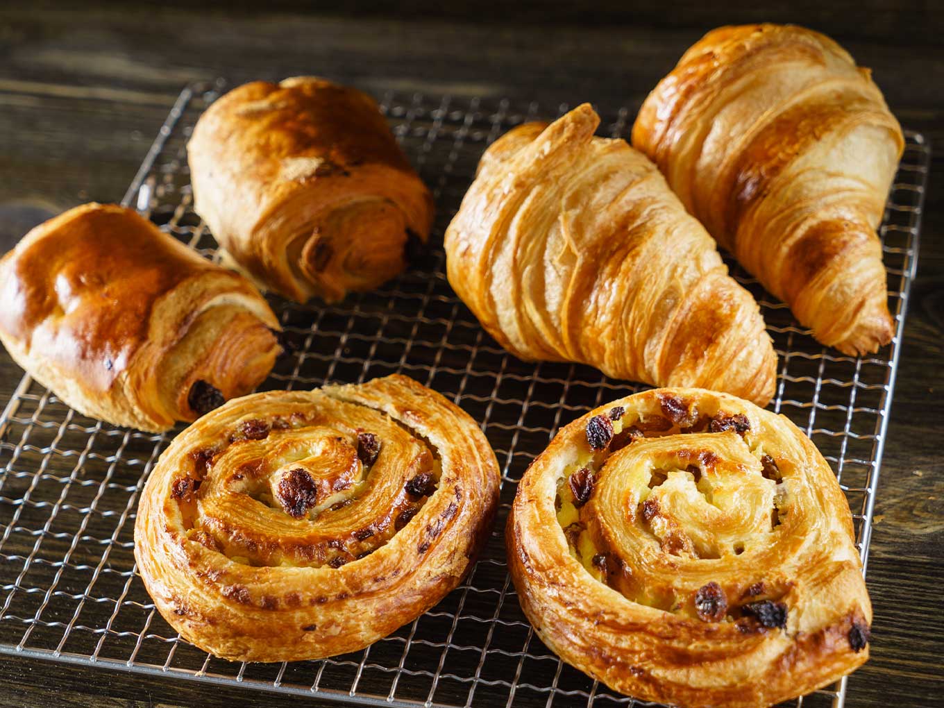 Various pastries on a cooling rack